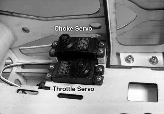 Mount the throttle and choke servos as shown here.