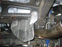 4) Replace the heat shield using a 15mm socket and ratchet. (See Fig. CC) 5) Slide a 3 TORCA clamp over the tip assembly and place the tip onto the end of the tailpipe.