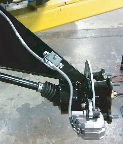 REAR SUSPENSION 1. Jack up the rear end of your Commander and rest it securely on jack stands.
