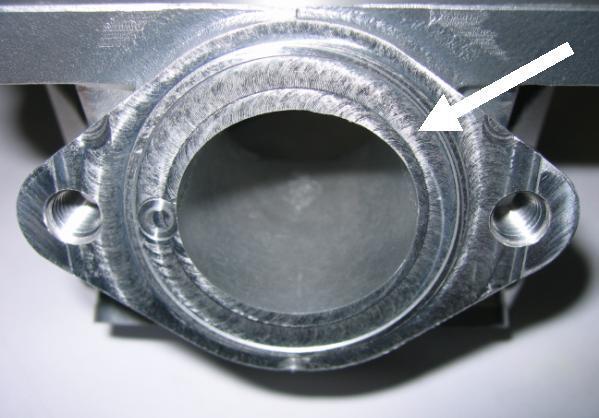 5.7.3 The sealing flange for the exhaust socket may show either cast finish surface or signs of machining from the manufacturer.