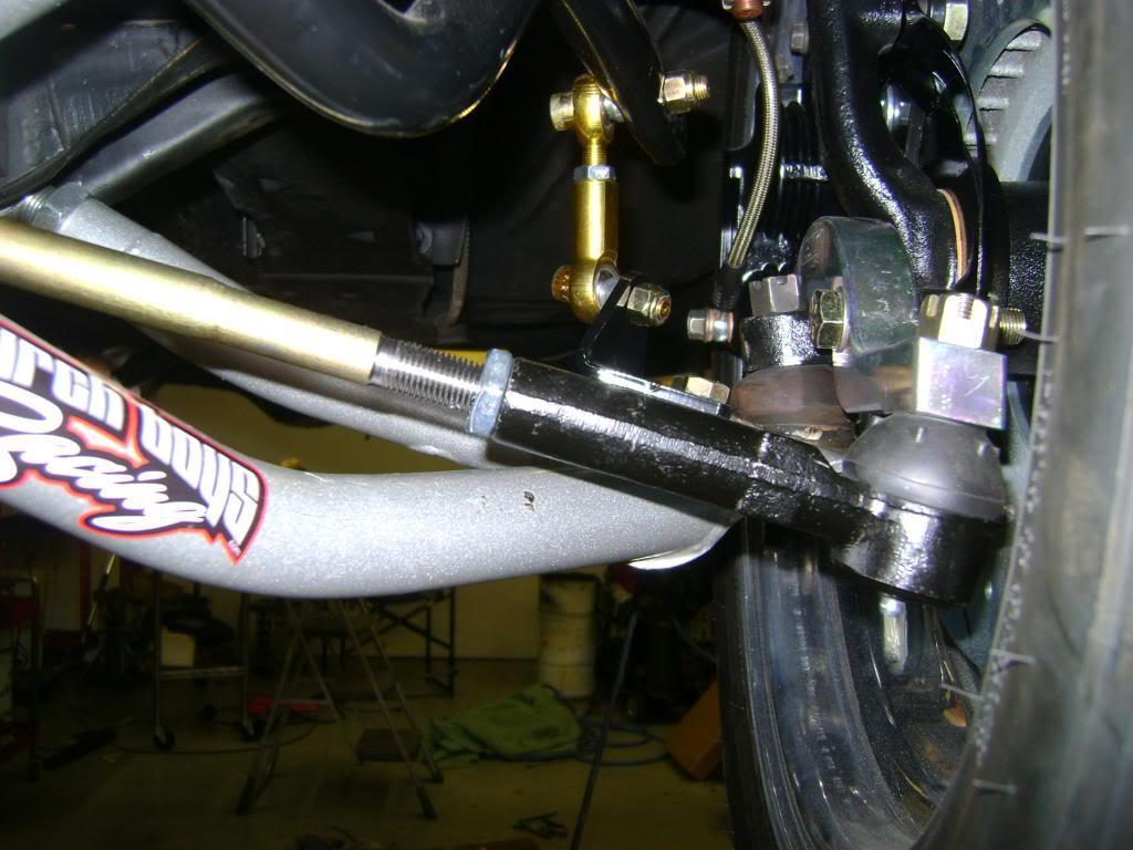 With your car resting on its wheels you can now install your tie rod ends.