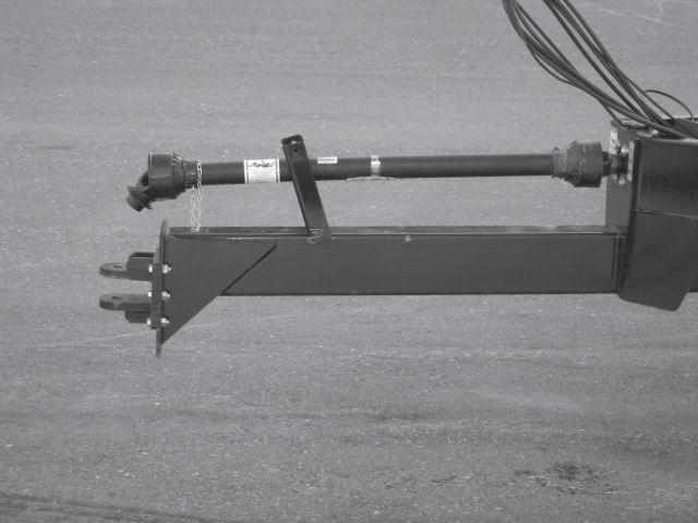 with a locking device or safety clip. The spreader hitch is attached with six bolts and can be moved up or down to accommodate various draw bar heights.