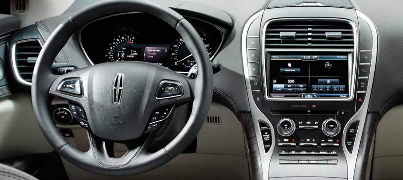 Instrument Panel 1 Power Tilt and Telescoping Steering Column* Use the 4-way control to adjust the steering wheel to your desired position.