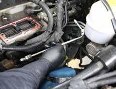 Remove factory quick connects from fuel lines to re-use with supplied fuel lines.