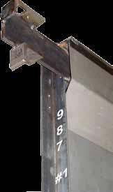 Be sure the hoist, hoist support, hoist chains, slings, straps, and any other accessories used to hoist the Door Panels into position are capable of