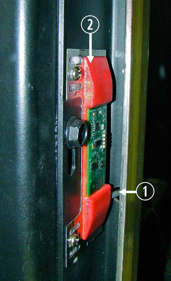 w Attach the isensor to the Lower Door Guide. The isen- SOR should be FLAT against the Guide Rail.