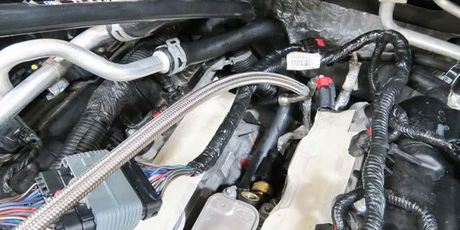 Carefully remove the lower manifold and set aside.