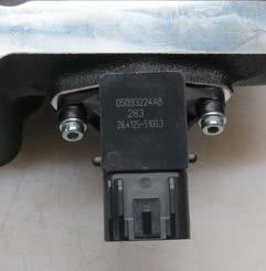 68. Remove the passenger side PCV hose from the back of the passenger valve