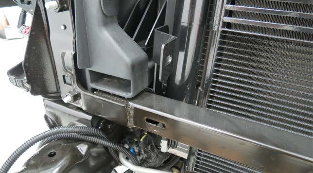 Position the LTR onto the LTR brackets with the fittings facing the passenger side of