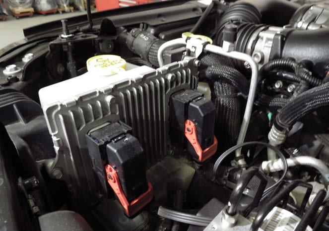 2015-2017 Jeep Wrangler ECM Removal The ECM on a 2015-17 Jeep Wrangler is located under the hood on the driver side of the vehicle.