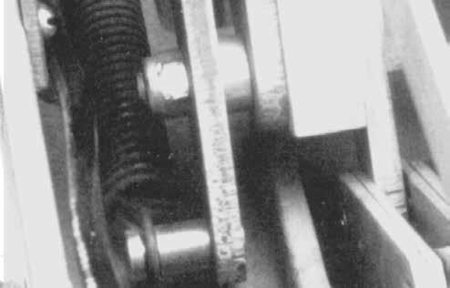 Discard roll pin. (Figure 21). 6. Remove large roll pin to free shaft. Save roll pin. 7. Slide main shaft aside to gain clearance for removing old microswitch cam. Note orientation of cam on shaft.