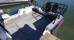 The 32 Sentry features a flush deck walkaround design with strategically placed grab rails for