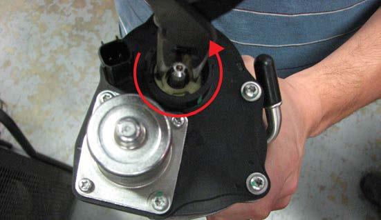 Use a T20 Torx driver to remove the motor housing, plastic capped spring and TPS from the OEM throttle body.