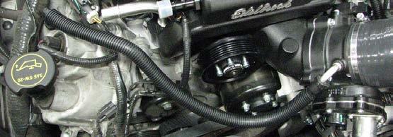 The flexible elbow should be oriented so that it can be easily mated to the air cleaner cover outlet tube.