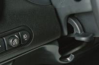Adjustable Accelerator and Brake Pedals (if equipped) 6 Tilt/Telescoping Steering Wheel Adjusting the Steering Wheel 1. Push down the lever located on the left side of the steering column. 2.