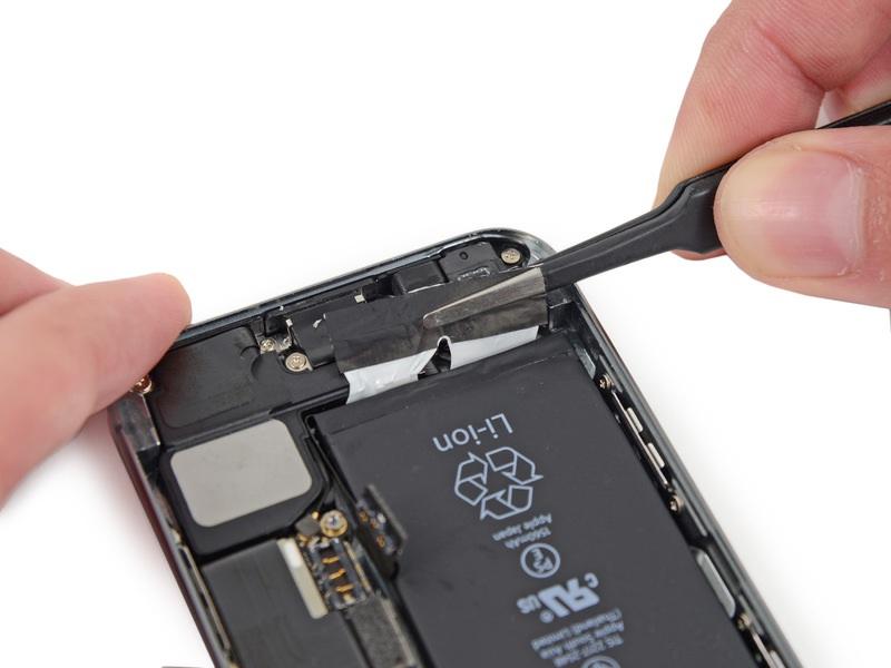 Step 24 Pull the battery adhesive tab away from the phone.