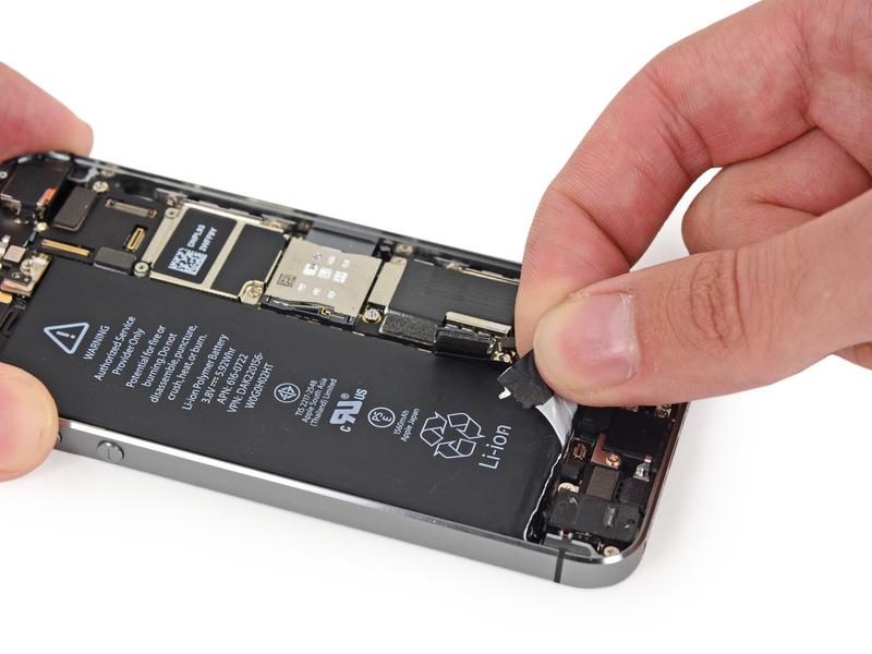 Slowly pull one of the battery adhesive strips away from the battery, toward the bottom of the iphone.