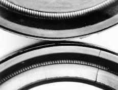 Remove any seal material that may have sheared off in the seal bore or retaining ring groove.