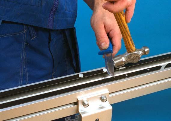 1 Mounting 1 Press or screw the screws into the holes using a pair of pliers or a screwdriver.