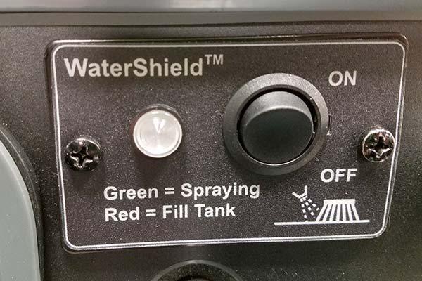 Use the wet side brush dust control switch to turn the water sprayer on and off. Bottom (OFF) position: Water sprayer is off. Top (ON) position: Water will spray when the machine is moving.