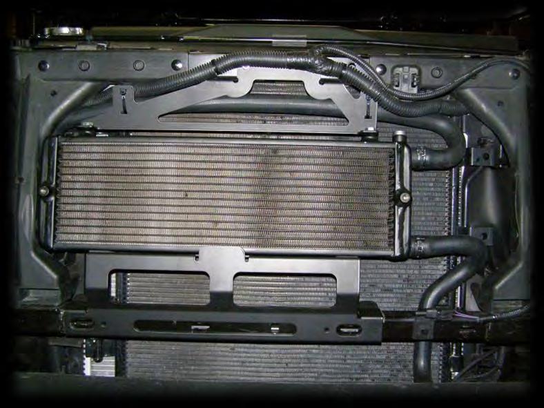 (see image) Prior to installing the radiator to the vehicle, install the ¼ BSPP plug into the radiator and tighten to 16Nm.