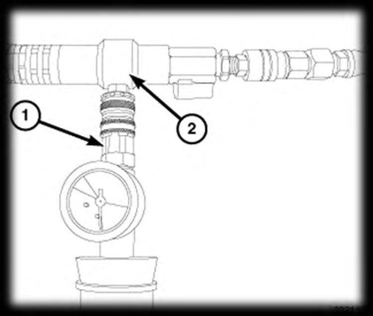 Remove the adaptor cone/vacuum gauge assembly from the radiator filler neck or reservoir tank.