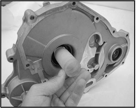 Once crankshaft seal is installed into the gear / stator housing cover, set the direction of the paper lip by sliding the Main Crankshaft Seal Saver (PA-45658) into the crankshaft seal from the