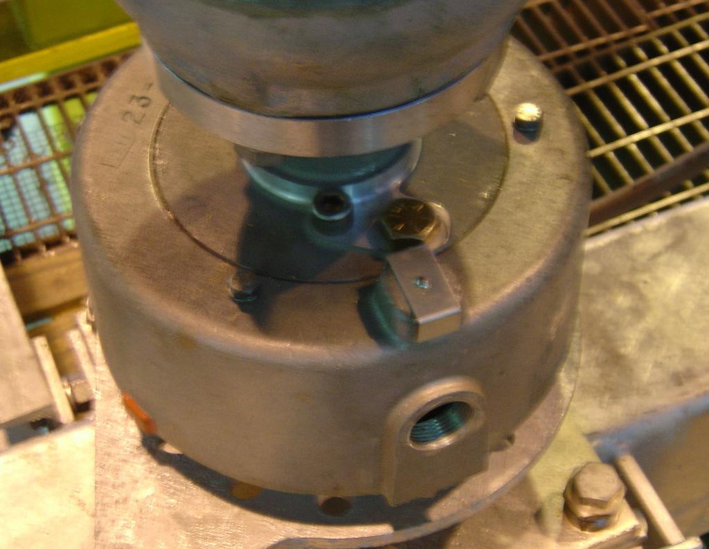 Problems: Over time the seals for the two-piece casting (Figure 2) allowed moisture to