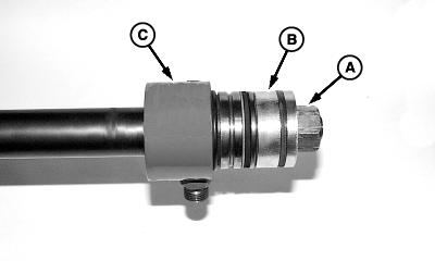 100 Wire Locked Cylinder 15 2 6. Pull rod assembly (A) from cylinder barrel (B).
