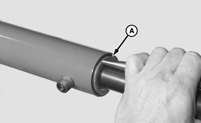 100 External Snap Ring 20 2 5. Using a wooden dowel or brass drift, drive rod guide (A) into cylinder past barrel snap ring groove. 6.