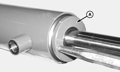 100C External Snap Ring 25 2 5. Using a wooden dowel or brass drift, drive rod guide (A) into cylinder past barrel snap ring groove. 6.