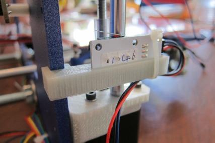- The endstop-holder gets snapped onto the blue frame and the Z-axis smooth