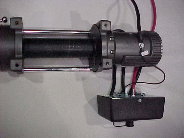 Prior to installing the winch on the Mounting Plate, refer to Photos 3 & 4 attach the ground wire to the motor.