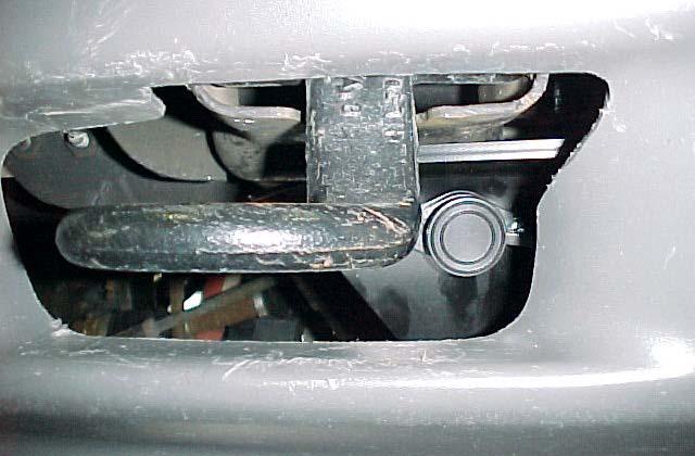 8. Photo 8 shows a position down by the right hand tow hook. Holes are provided in the Winch Mounting Plate. This position also has a clean appearance, but is a bit more difficult to use.