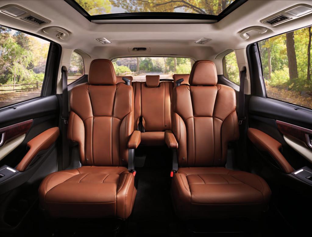 Ascent Limited bench seating in Warm Ivory Leather with optional equipment. That front-row feeling in every row. Ascent Touring standard captain s chairs in Java Brown Leather.