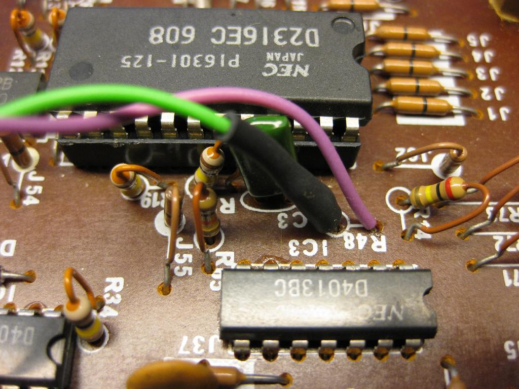 Locate resistor R48, it is below the largest chip(ic 10) on the board. See picture 5. Cut the wire of the resistor in such a way that you can solder a wire to both sides of the resistor.