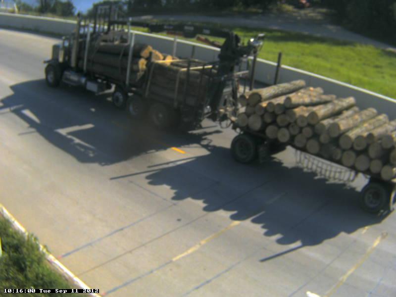 Photo 31A: Class 12, 6 axle Twin Trailer; Stake; Timber. This one weighed 102,000 pounds!