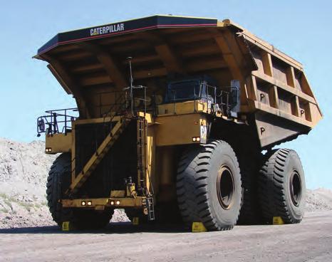 WHEEL CHOCK GUIDELINES WHEEL CHOCK COMPARISONS Four Monster wheel chocks, model MC3011 used on a 400-ton CAT 797 COMPARED TO METAL WHEEL CHOCKS.
