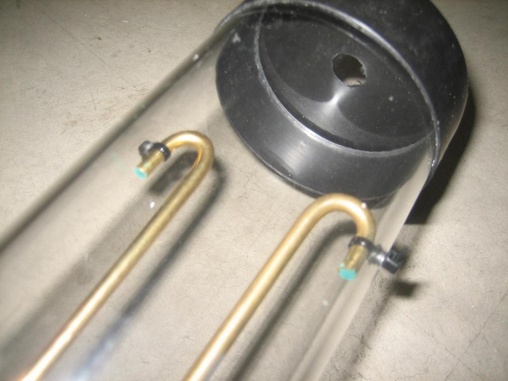 13) Once the system is running properly, you will need to find the top hole locations to run the black zip ties through to secure the top of the brass rods.