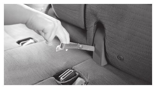 Release the strap to lock the seatback in position. 02 01 FOLDING DOWN THE REAR BENCH SEAT To fold the seats flat, secure the seat belts on the seat belt hooks on the side wall.