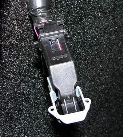 There are three OEM plug connectors that unplug from the top three set of controls on the back of the outside panel.