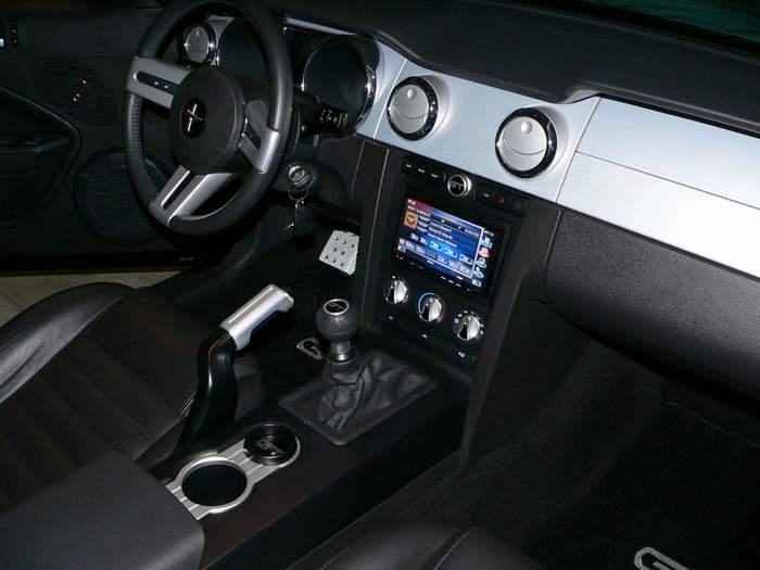 head unit to the center stack, reinstalling the outside panel, side panels, center