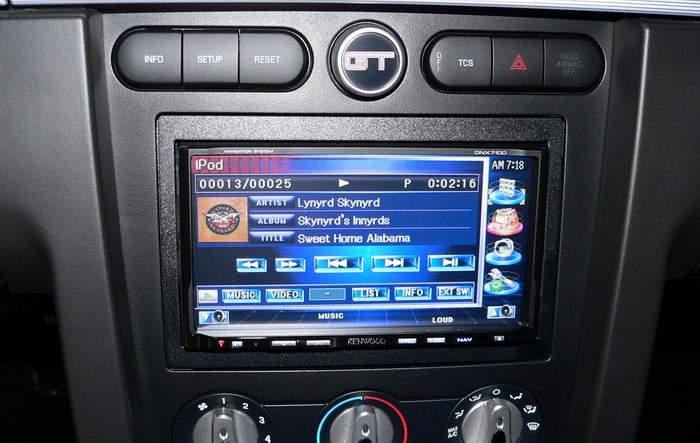 The I-pod is recharged when connected to the docking connector in the armrest glove box. Overall I m really pleased with the Kenwood DNX7100 head unit.
