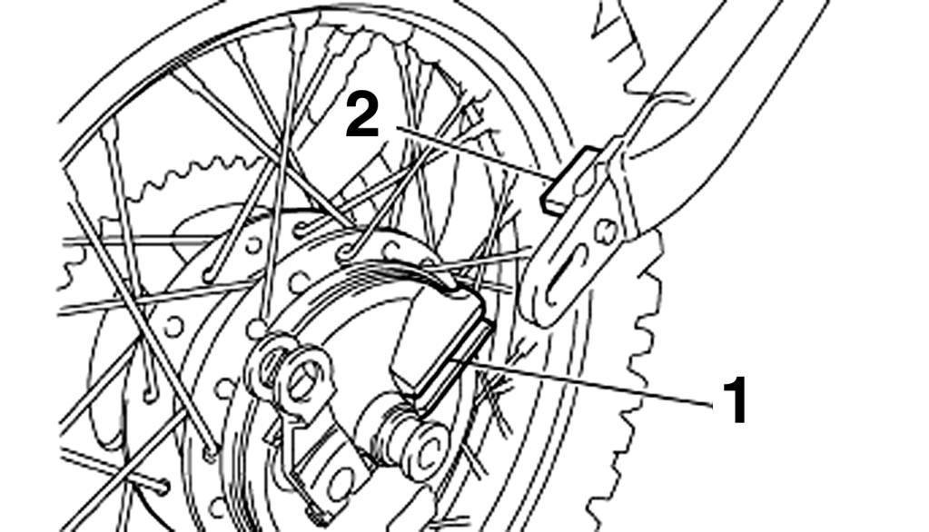 PERIODIC MAINTENANCE AND ADJUSTMENT 1. Slot 2. Retainer 2. Install the drive chain onto the rear sprocket, and then adjust the drive chain slack. (See page 7-21.) 3.