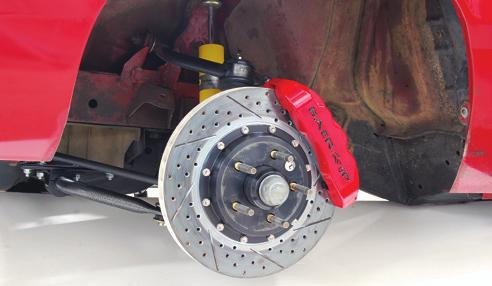 The two-piece Baer rotor is 13 inches in diameter and is 1 1 4 inches thick. The aluminum caliper uses Mustang dimensions in order to work with the Bullit wheels.