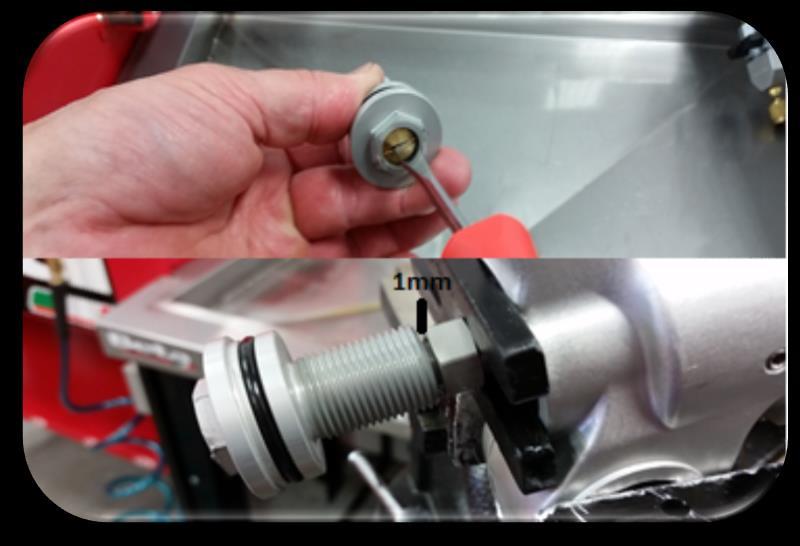 Press in on the cartridge and remove the holding tool.