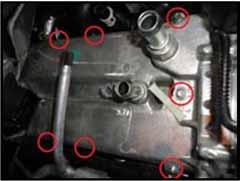 21. Remove the seven 8mm bolts holding the EGR system to the