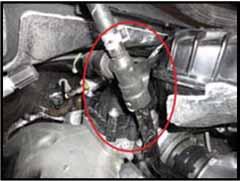 24. Reconnect the coolant line with the snap fitting, ensure the