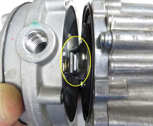 The photo is for illustration purposes only and any excessive force may damage the plate slot or actuator.