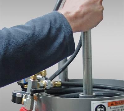 If refilling, the internal rubber diaphragm might be inverted inside the tank and must be gently pushed back into place using the handle or a clean blunt instrument